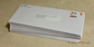 A small stack of QSL cards ready for sending.